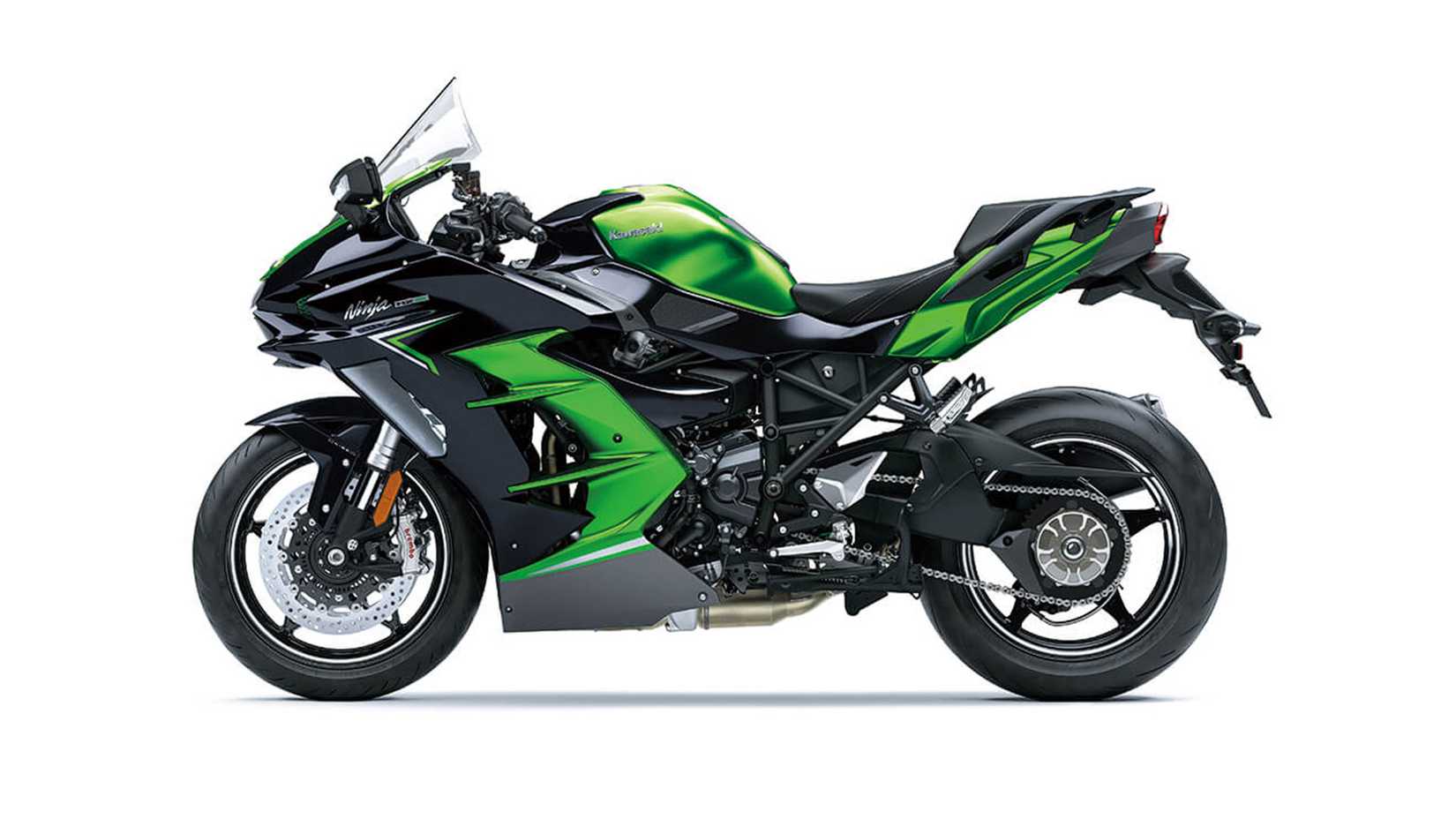 Fotografia de estúdio de perfil lateral de uma Kawasaki Ninja H2 SX SE 2023 em um fundo branco.