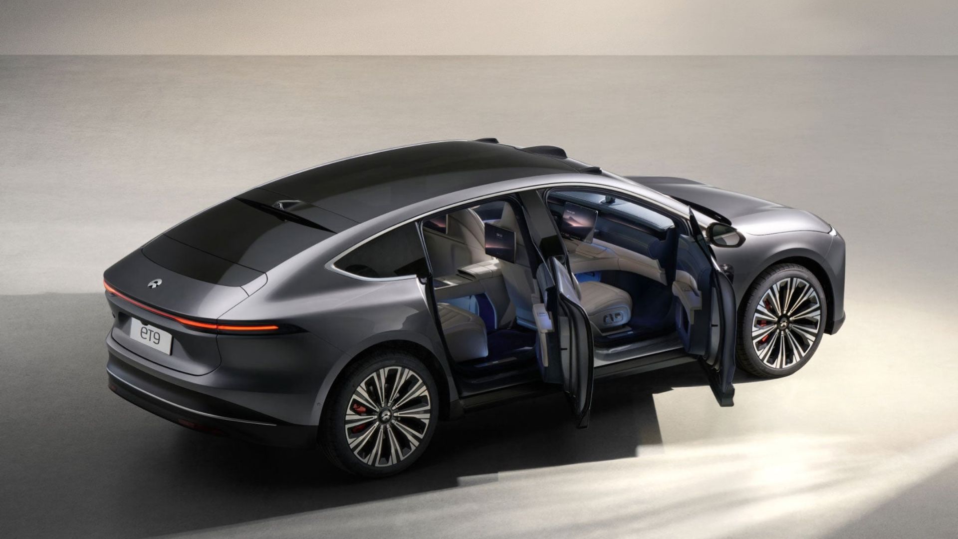 Overhead view shows the long 3,250 mm wheelbase and broad shoulders that house the SkyRide active suspension hardware