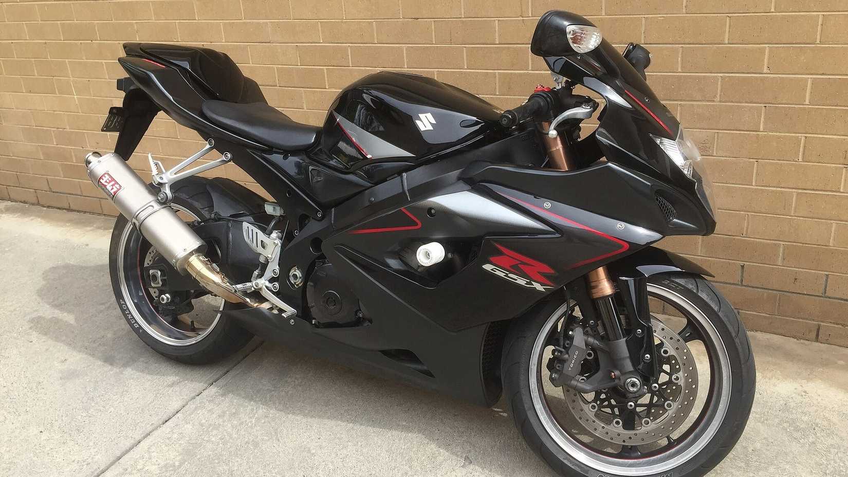 2005 Suzuki GSX-R1000 parked on the curbside front third quarter close-up shot