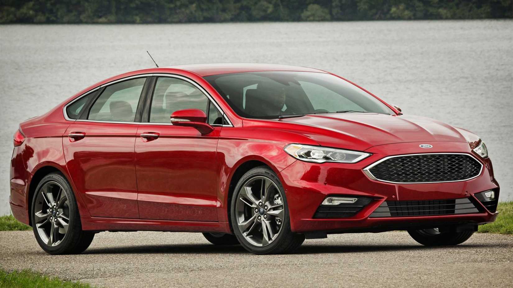 Front 3/4 view of 2017 red Ford Fusion V-6 Sport
