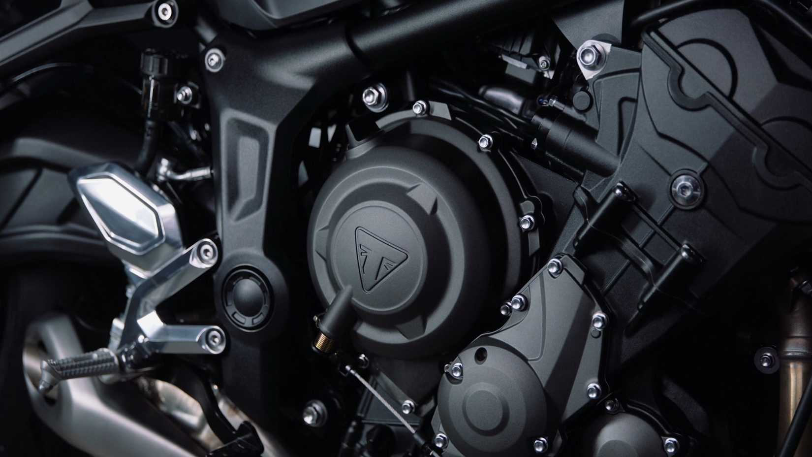 Close up of Triumph's 660 three-cylinder engine 