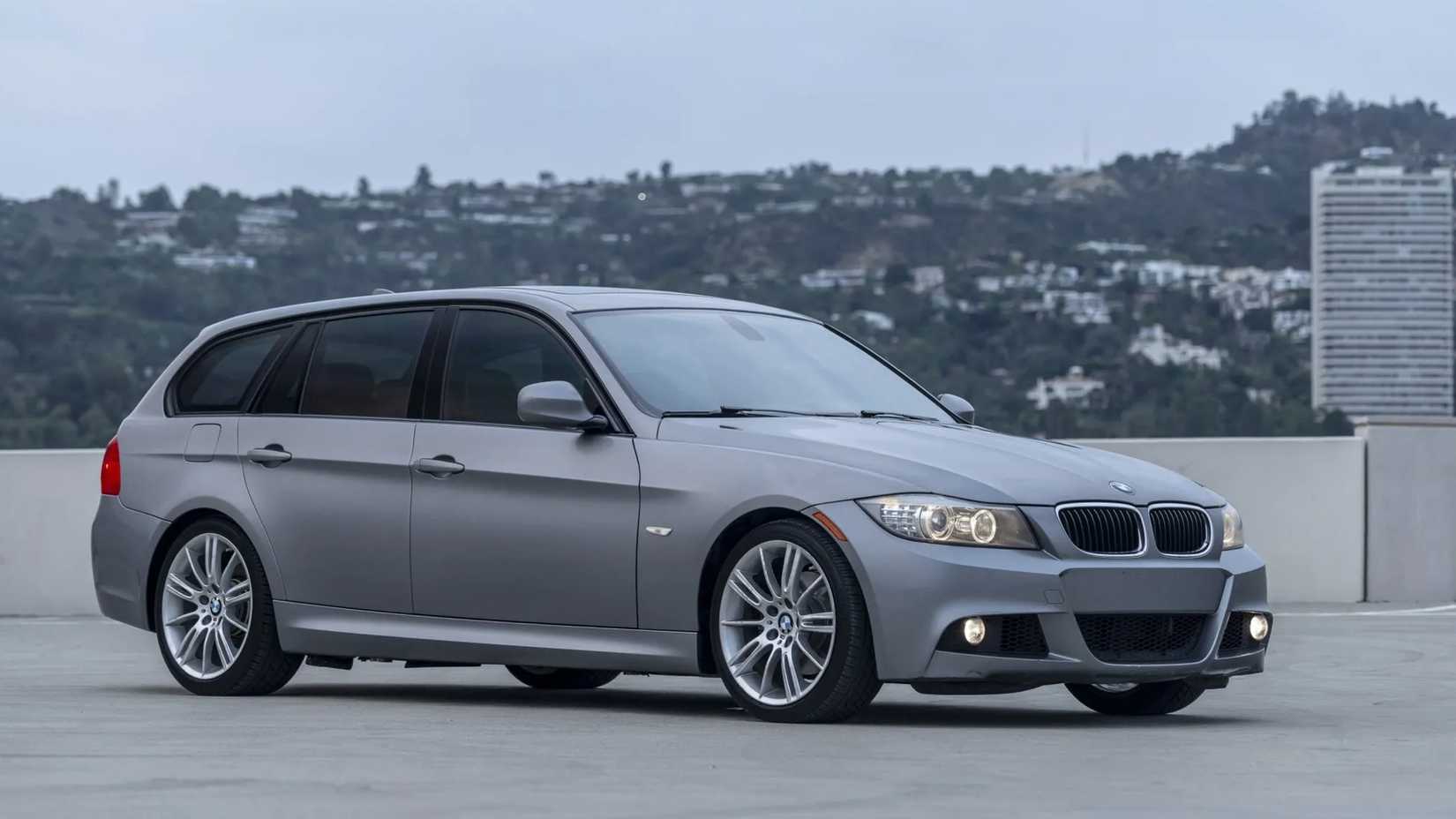 Grey 2011 BMW 328i parked outdoors