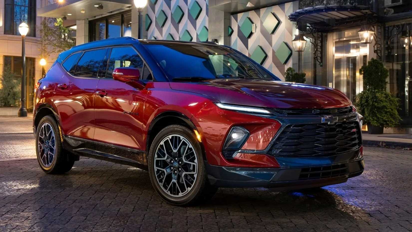 Front 3/4 shot of a 2023 Chevrolet Blazer in red parked
