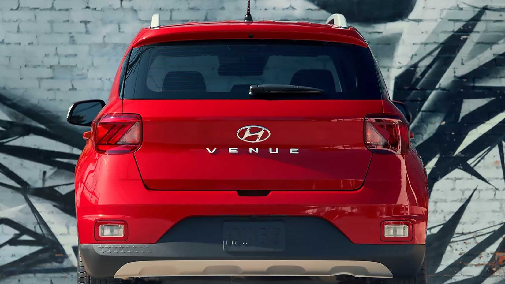 A Red 2024 Hyundai Venue 