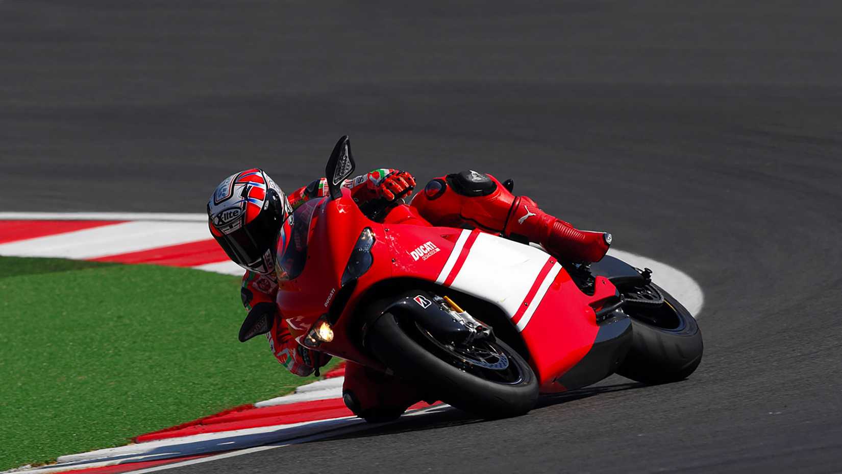 A Ducati Desmosedici RR cornering on racetrack