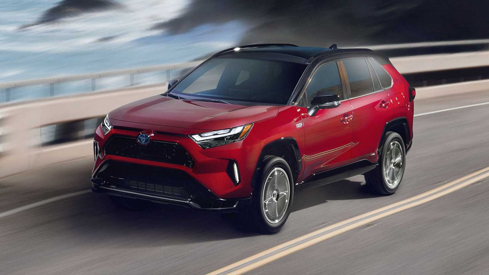 2024 RAV4 Prime driving on a coast road