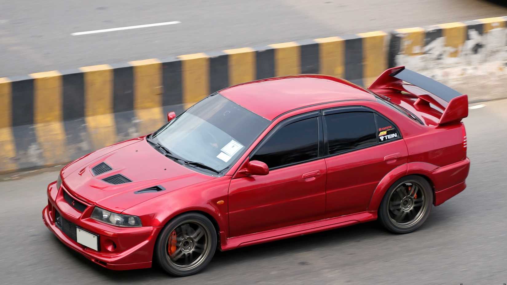 dark-red 1999 Mitsubishi Lancer Evolution 6