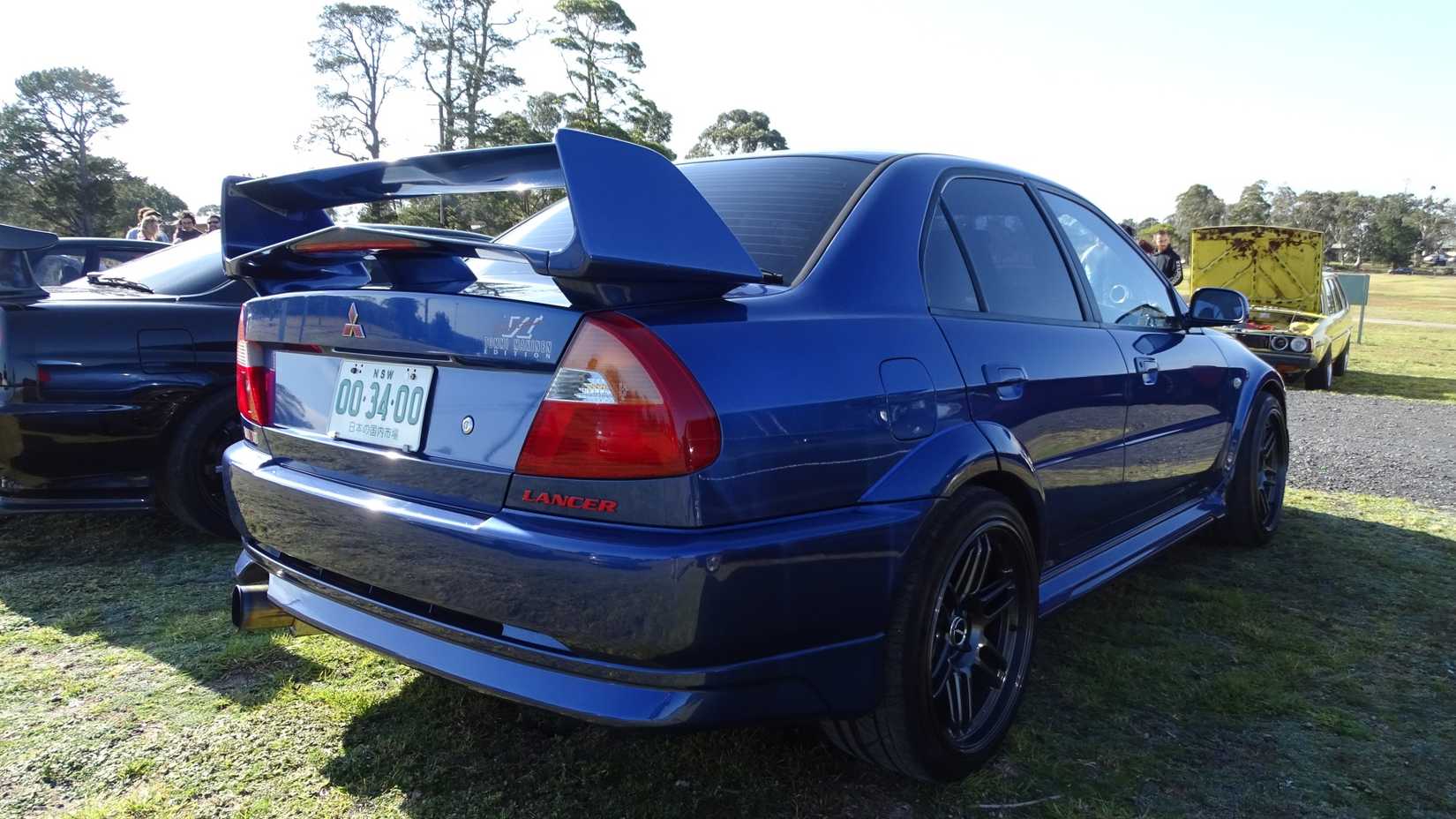 blue 1999 Mitsubishi Lancer Evolution 6 rear