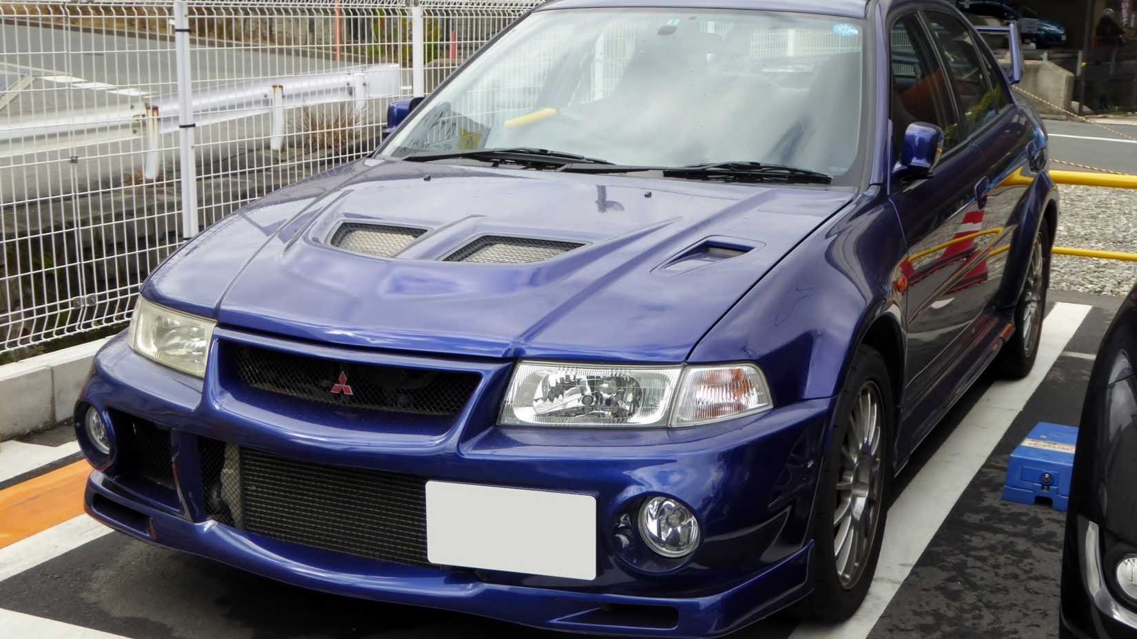 dark-blue 1999 Mitsubishi Lancer Evolution 6 GSR