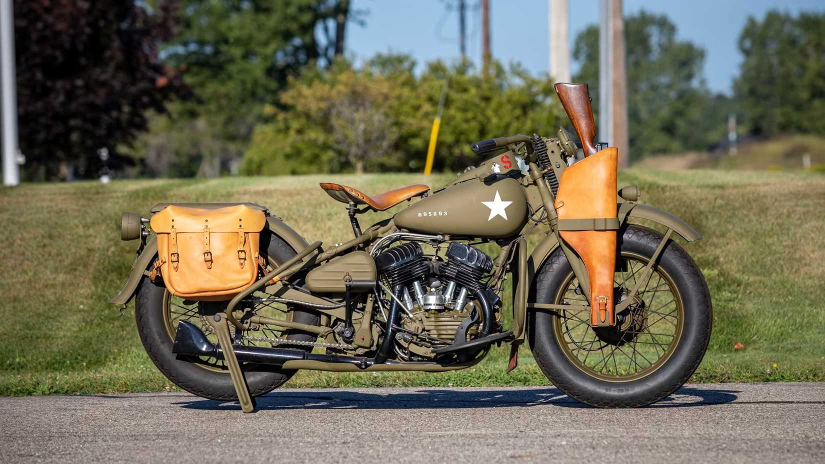 1942 Harley-Davidson WLA Liberator parked on the sidewalk, side profile view