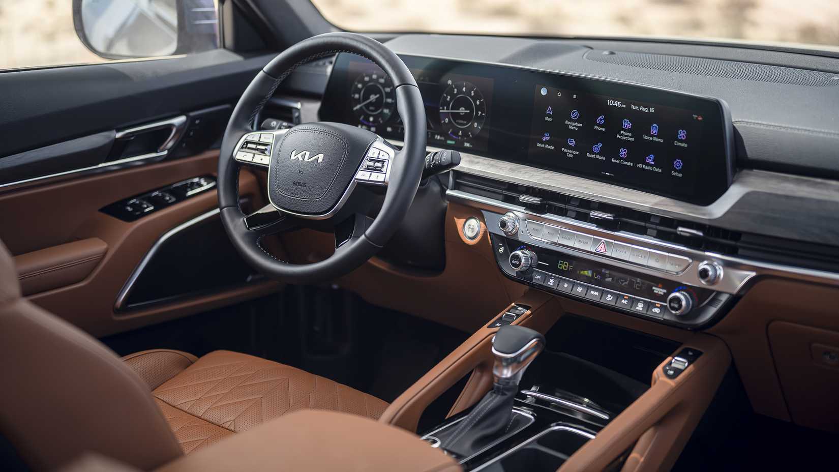 Foto do interior do Kia Telluride 2024 mostrando a cabine dianteira