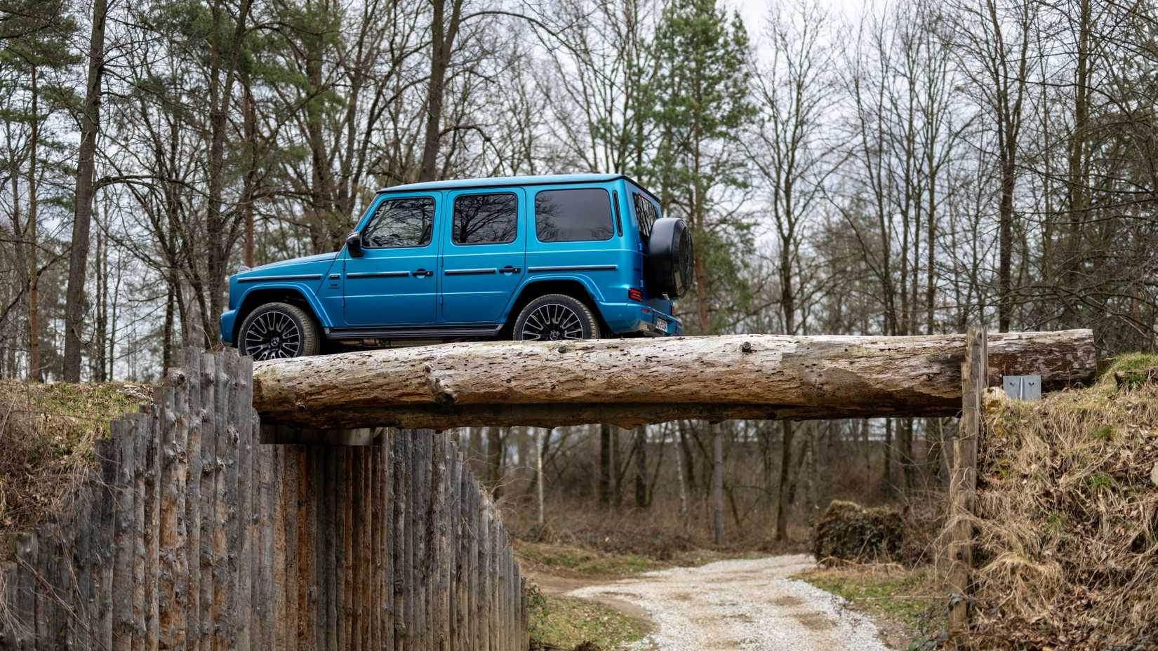 Mercedes-Benz G-Class side shot driving on off-road trail