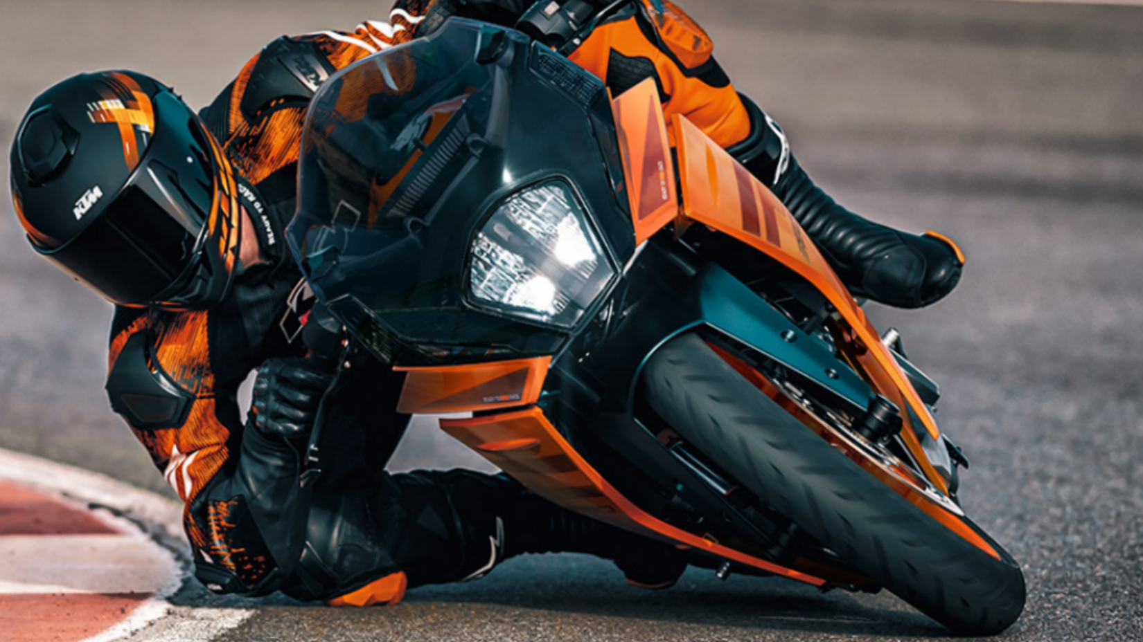 KTM RC 390 Elbow Down Left Corner On Racetrack
