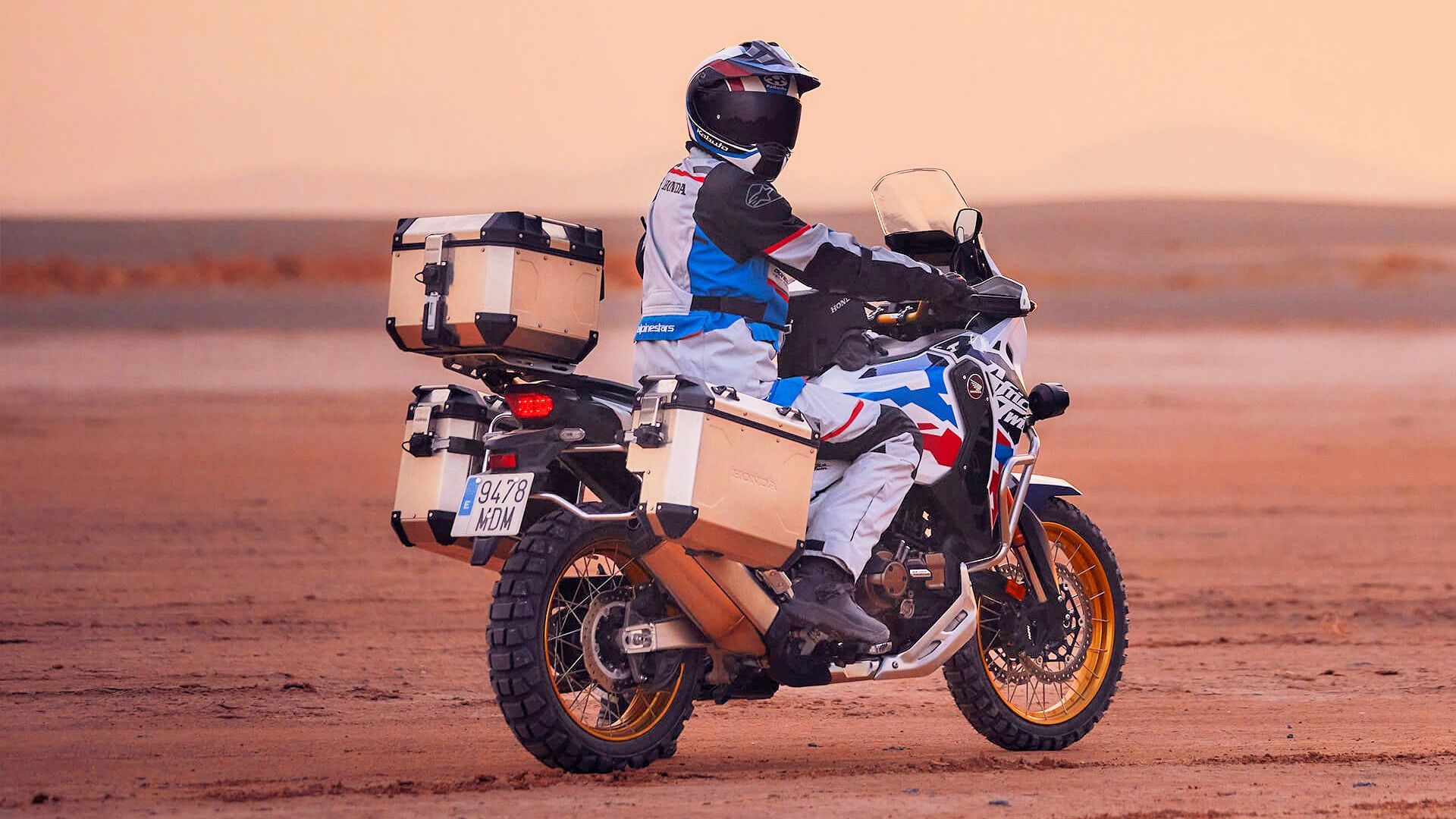 Rider sitting on an accessorized 2024 Honda Africa Twin Adventure Sports ES