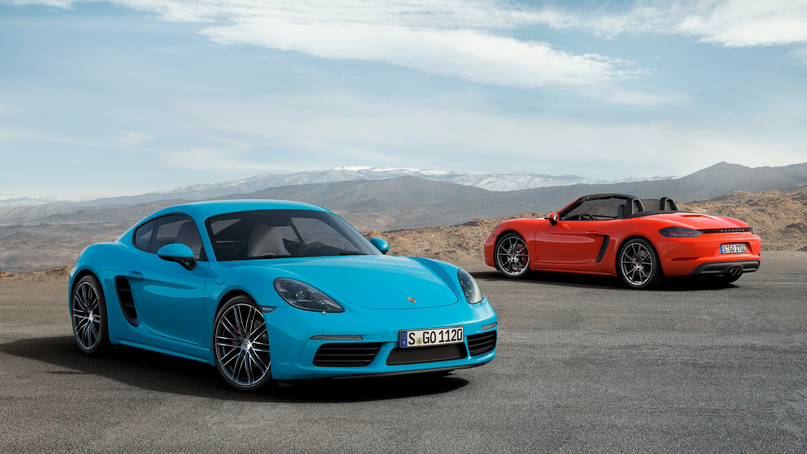 2024 Porsche 718 Boxster & Cayman posing parking lot