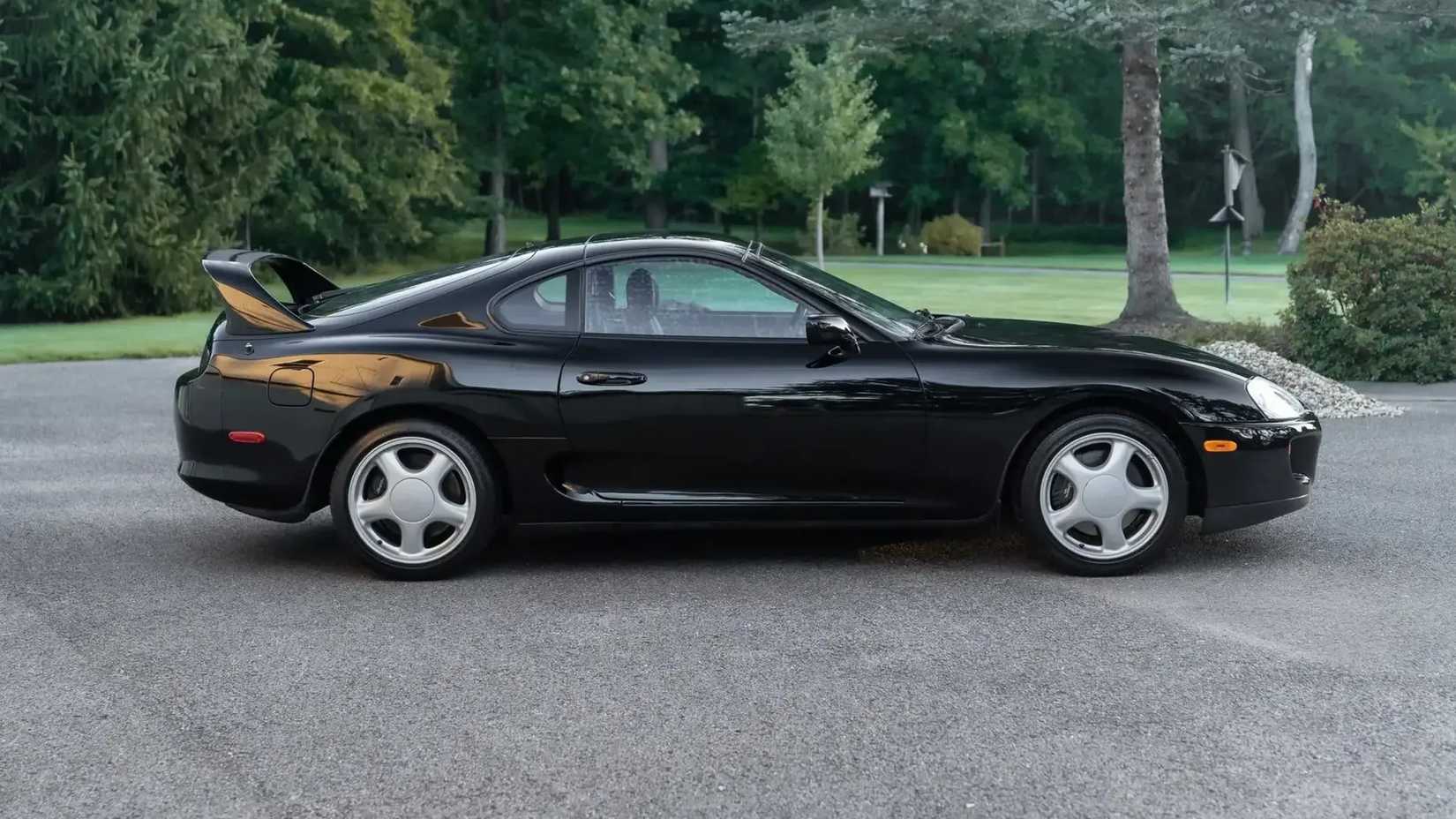 1994 Toyota Supra Turbo Side shot parked in a driveway