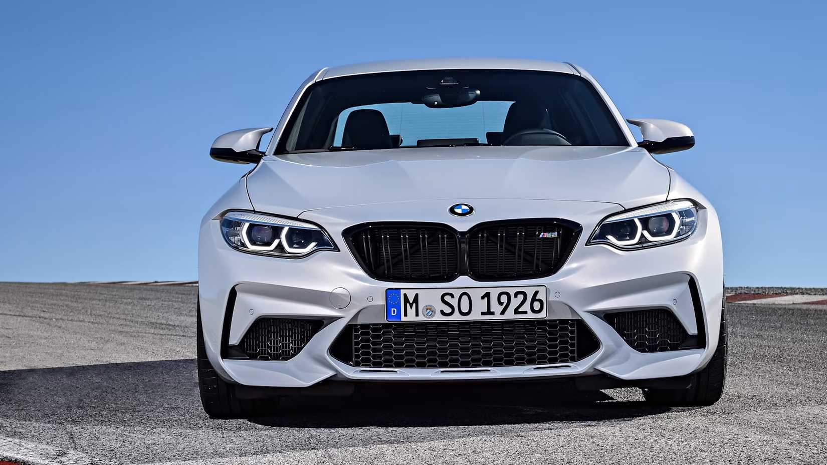 A Silver 2018 BMW M2 Competition front shot parked