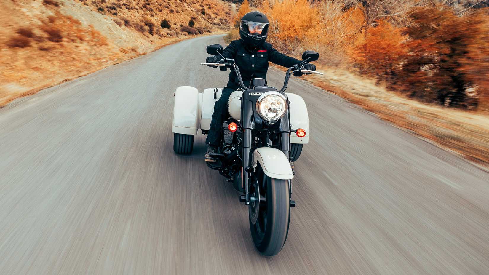 2023 Harley-Davidson Freewheeler cruising through the countryside