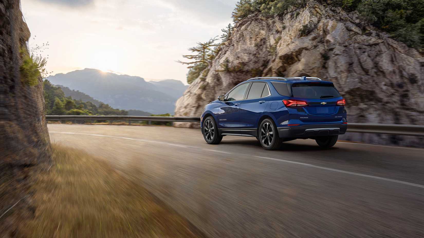 Rear 3/4 action shot of a 2024 Chevrolet Equinox