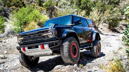 2024 Ford Bronco Raptor Code Orange front 3/4 shot rock crawling