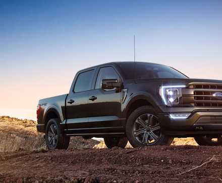 2024 Ford F-150 in black posing in desert