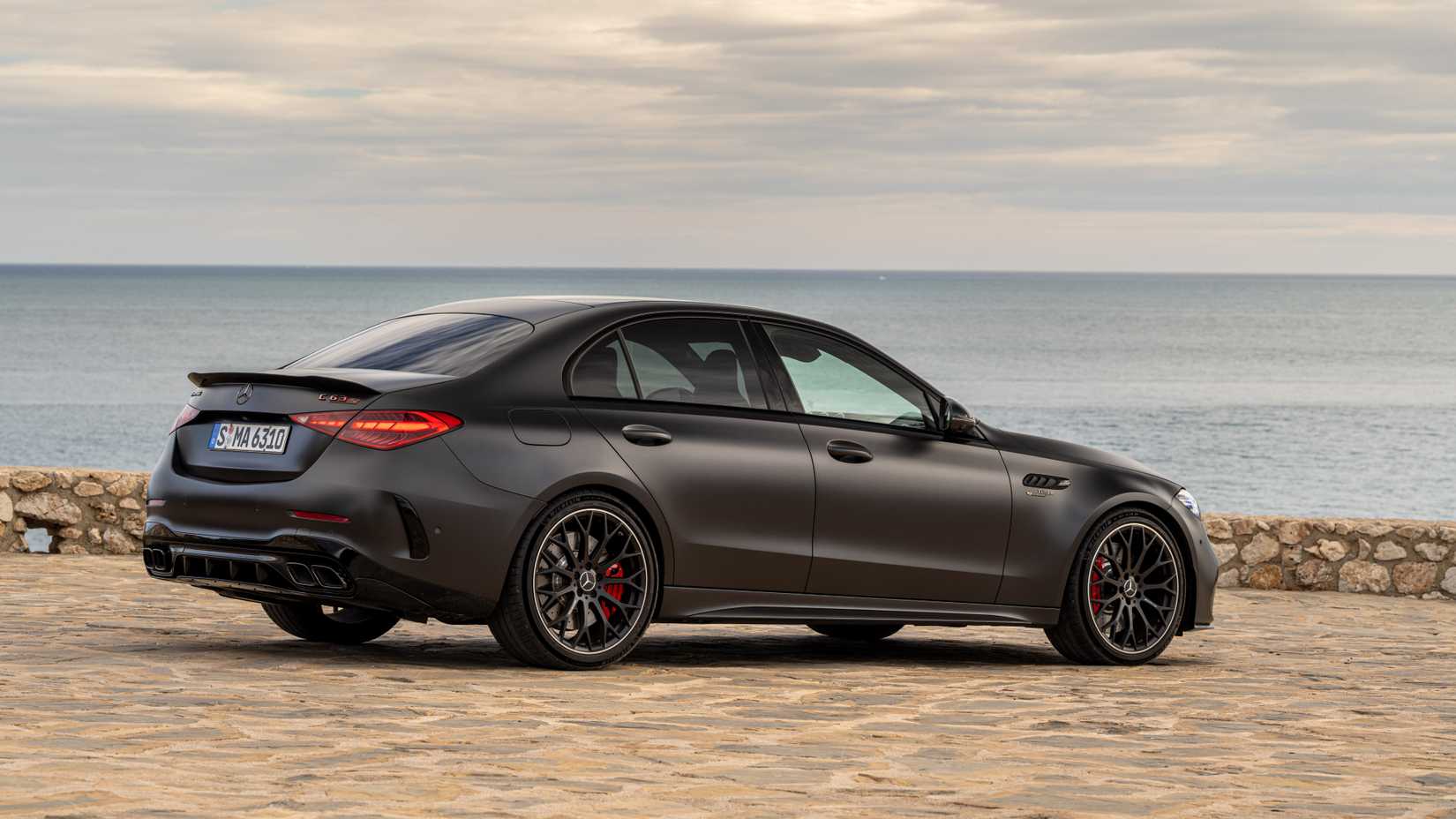 2024 Mercedes-AMG C 63 S E Performance parked beside a lake