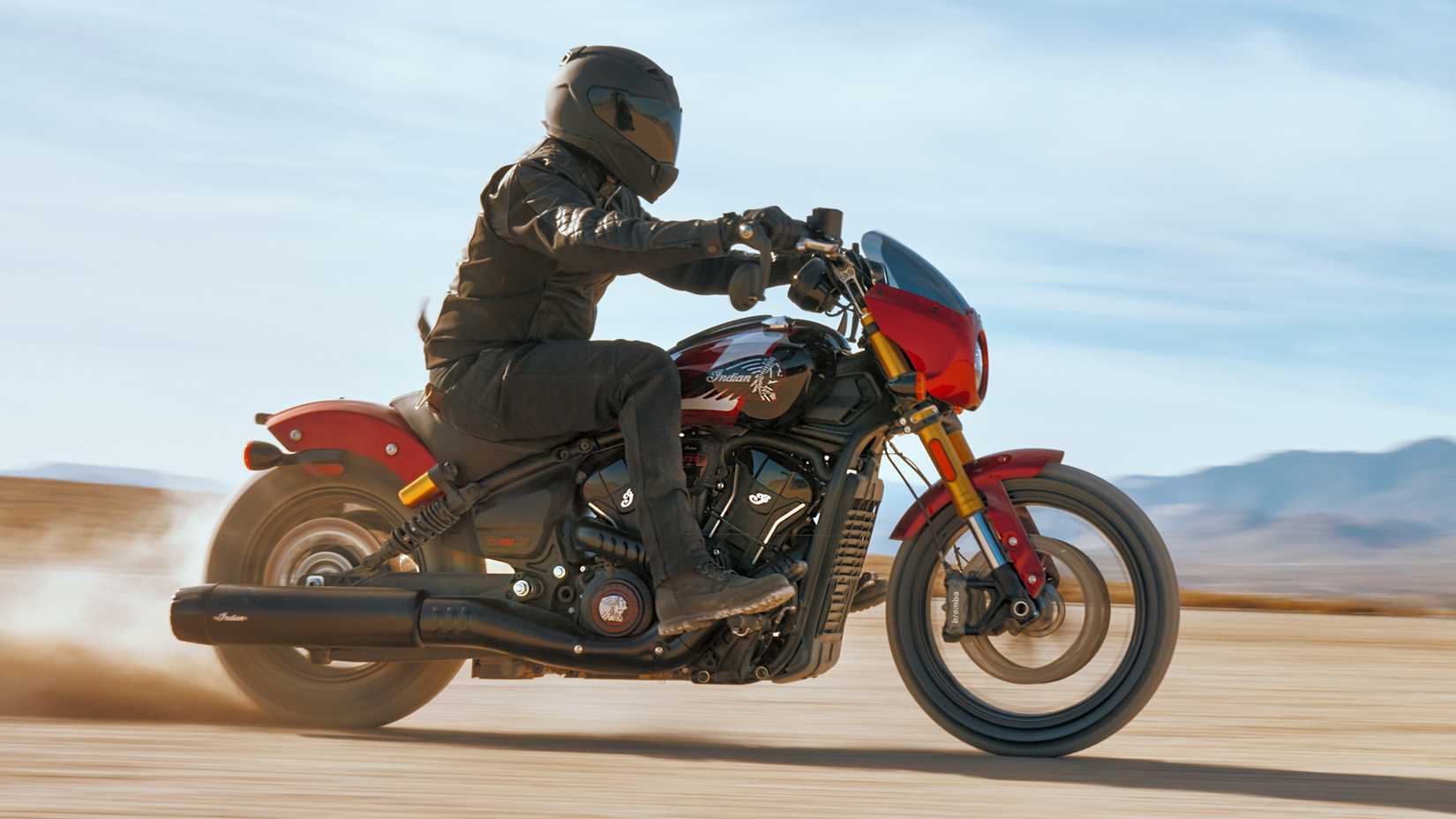 2025 Indian 101 Scout cruising across sand