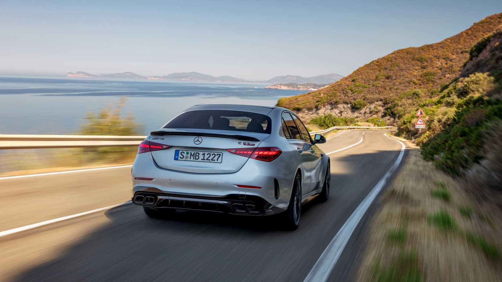 2024 Mercedes-AMG C 63 S E Performance sprinting down a highway