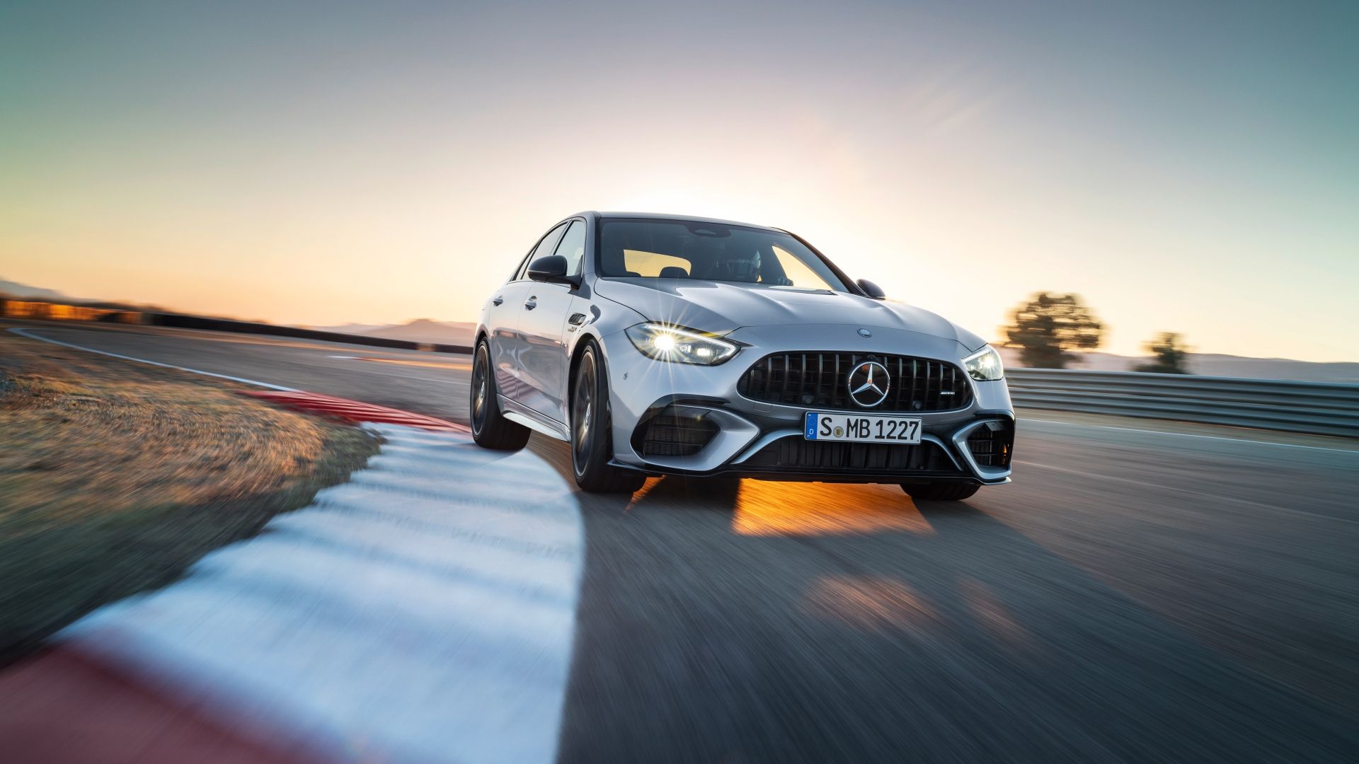 Silver 2024 Mercedes-AMG C 63 S E Performance cornering