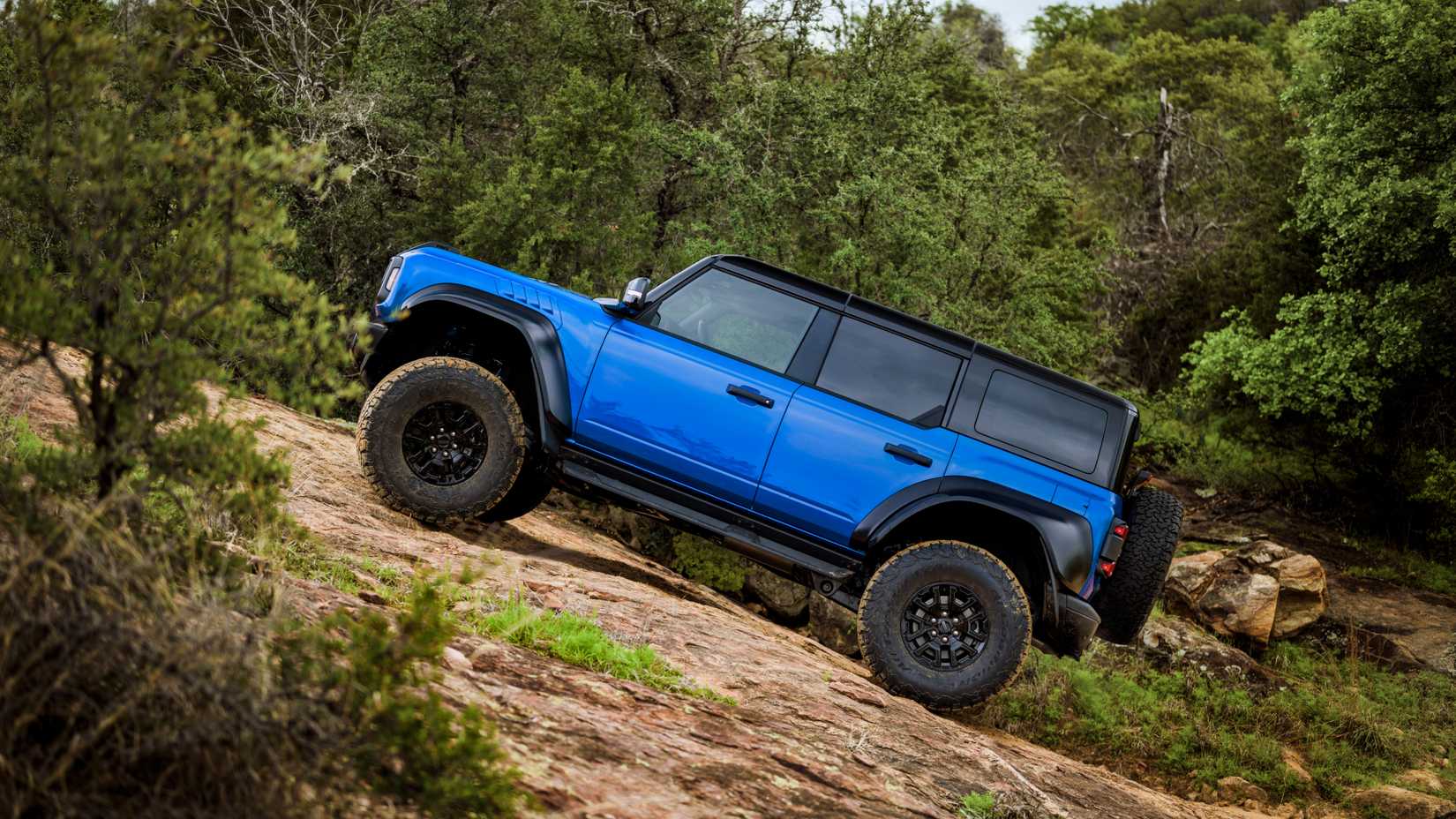2024 Ford Bronco Raptor Black Appearance Package in blue profile