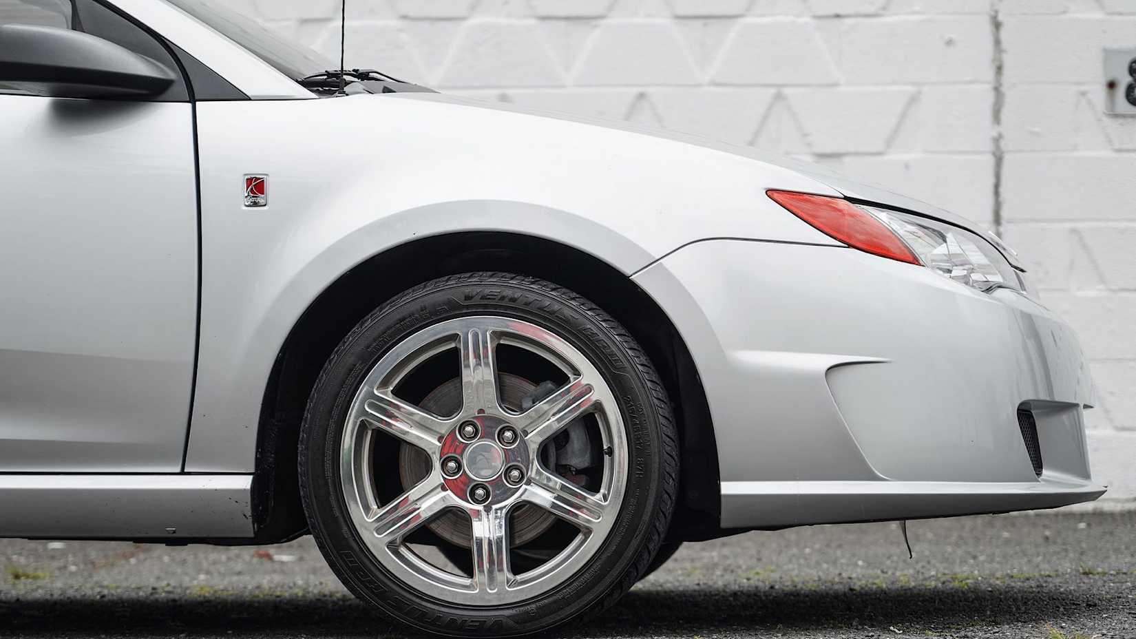 2004 Saturn Ion RedLine Coupe in silver front-end Showing wheels and hood