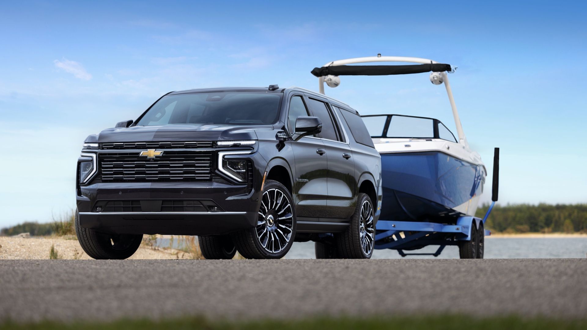 2024 Chevrolet Suburban in black towing