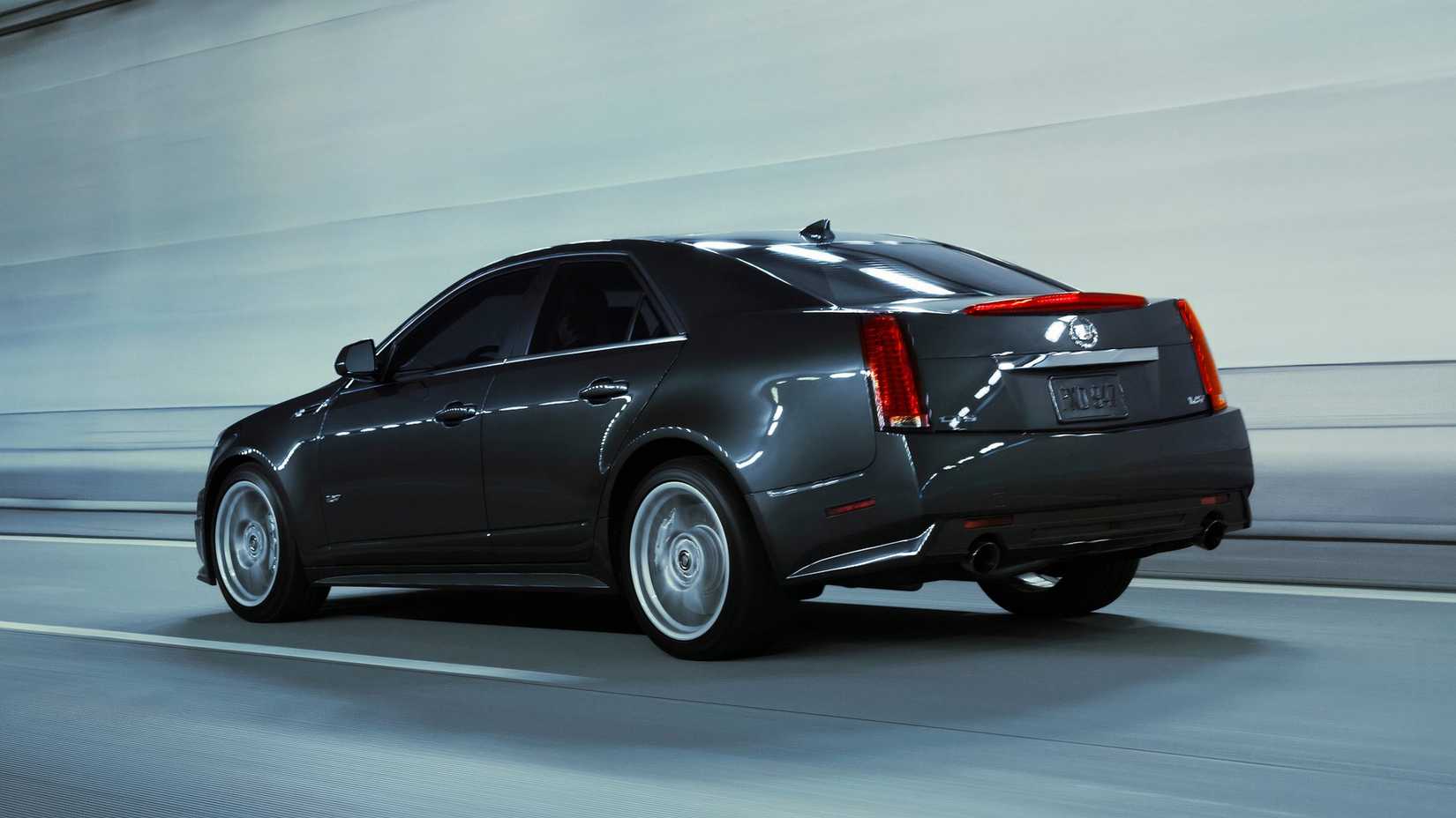 Grey 2012 Cadillac CTS-V Sedan On The Move Rear 3/4 View