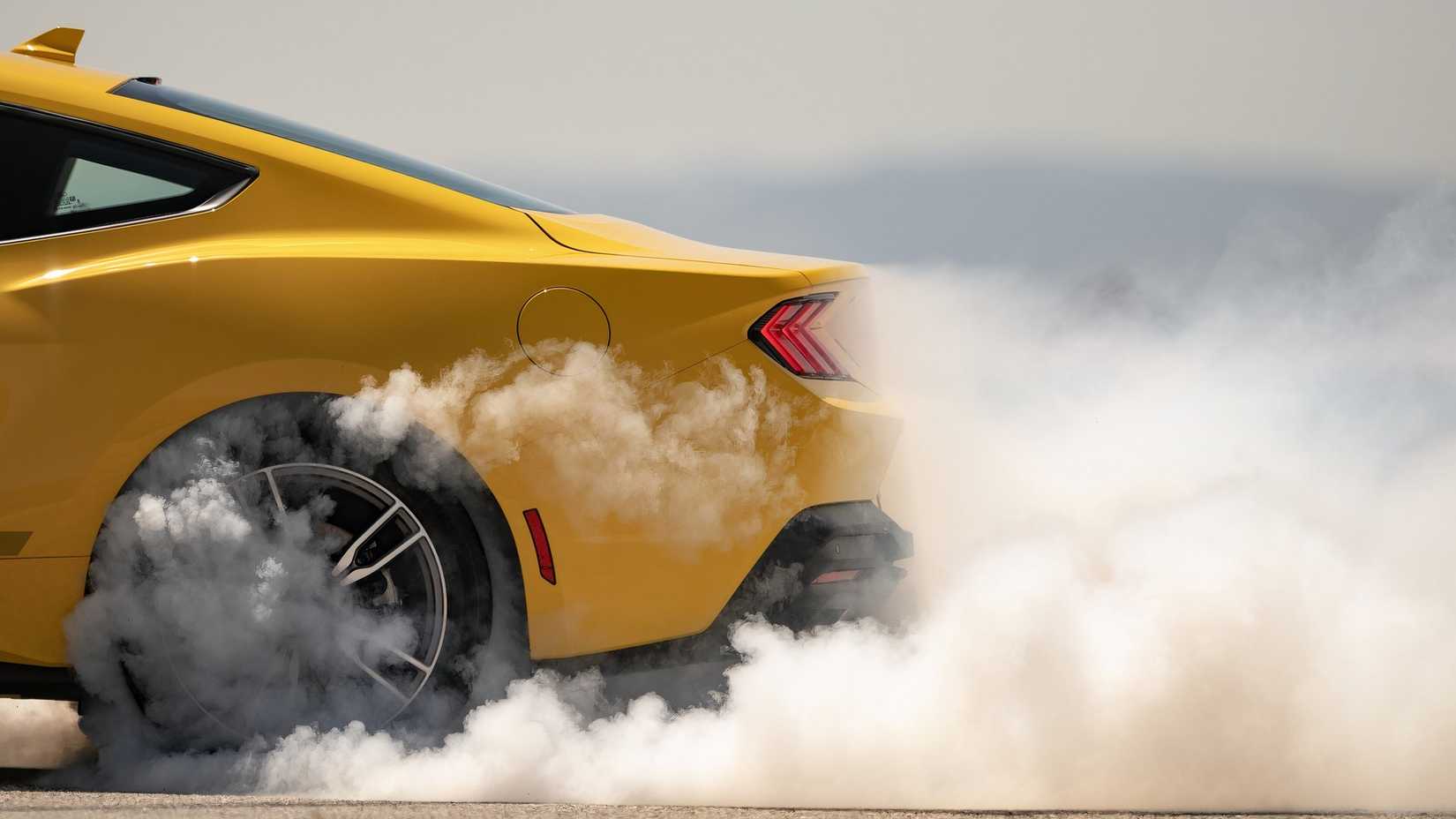 2024 Ford Mustang EcoBoost burnout close-up side shot