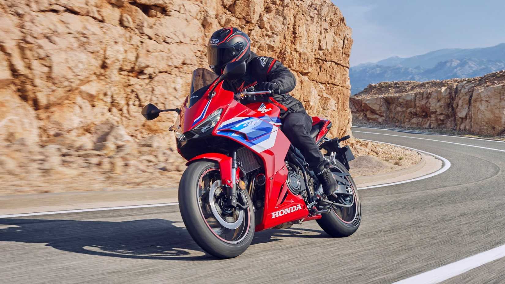 2025 Honda CBR500R Action Shot Grand Prix Red