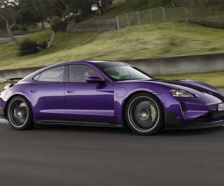 A side profile shot of the purple 2025 Porsche Taycan Turbo GT with Weissach Package