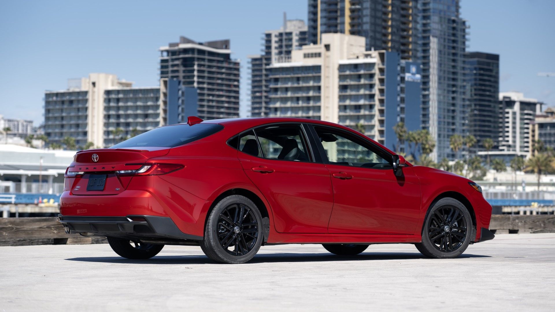 Red toyota Camry rear-quarter