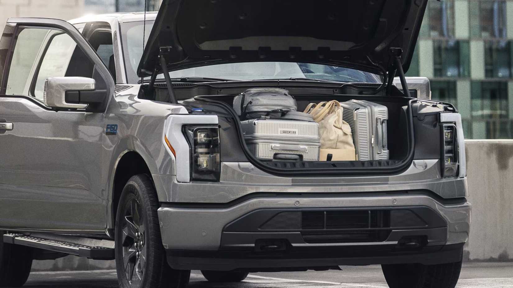 Gray 2024 Ford F-150 Lightning open front trunk