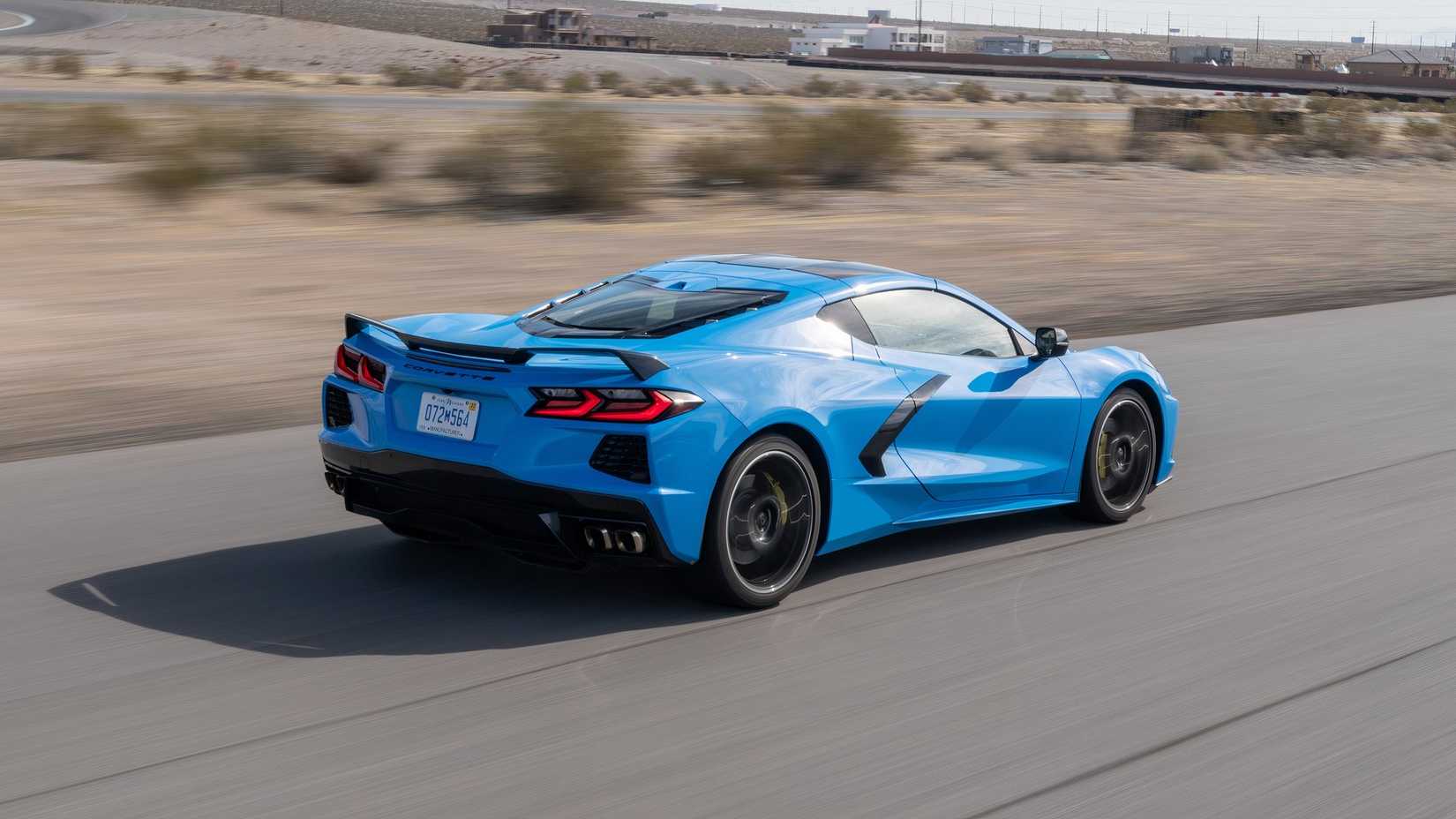 2020 Chevrolet Corvette Stingray blue rear end driving on a track