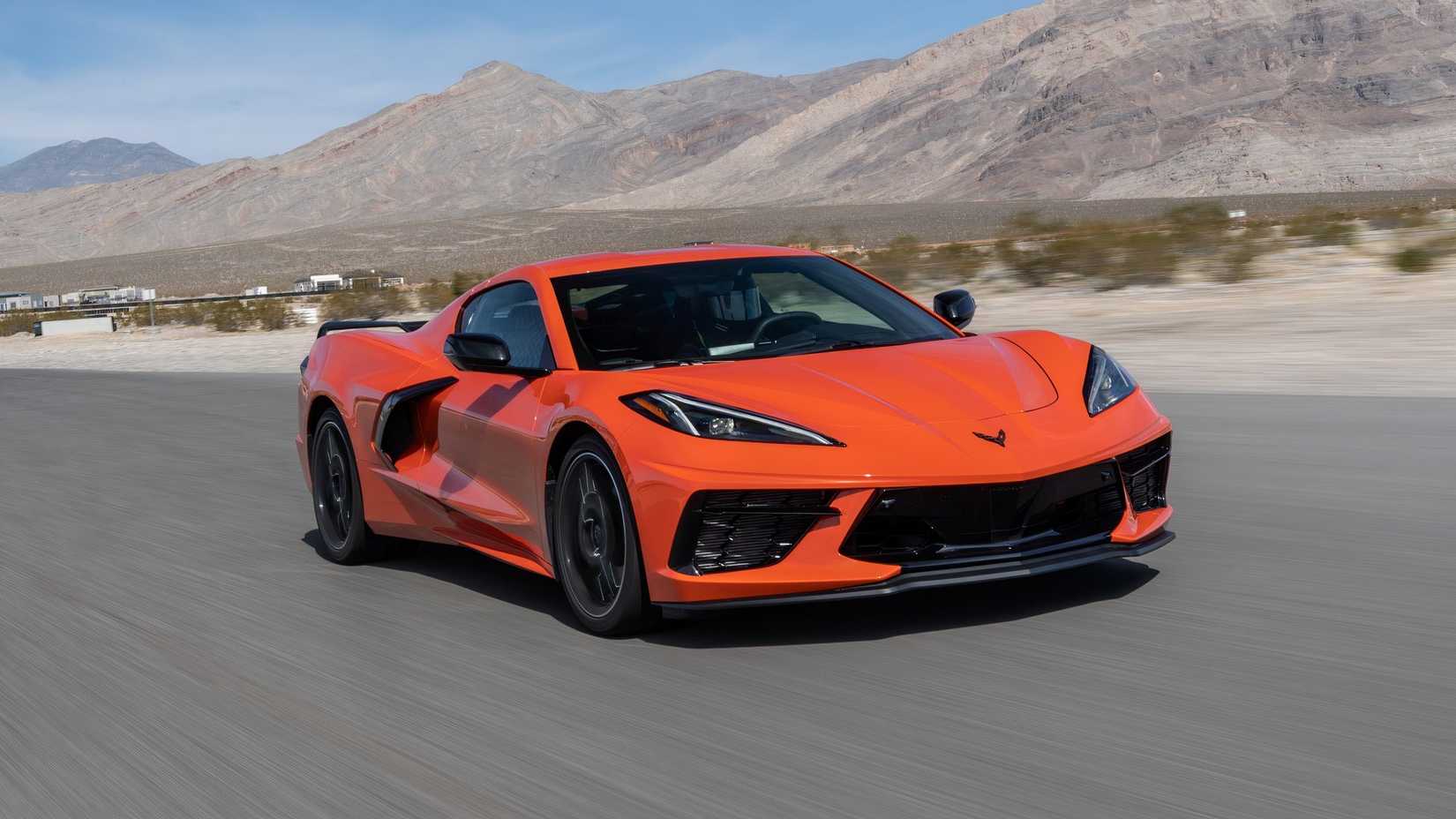 2020 Chevrolet Corvette Stingray orange front end driving on a track