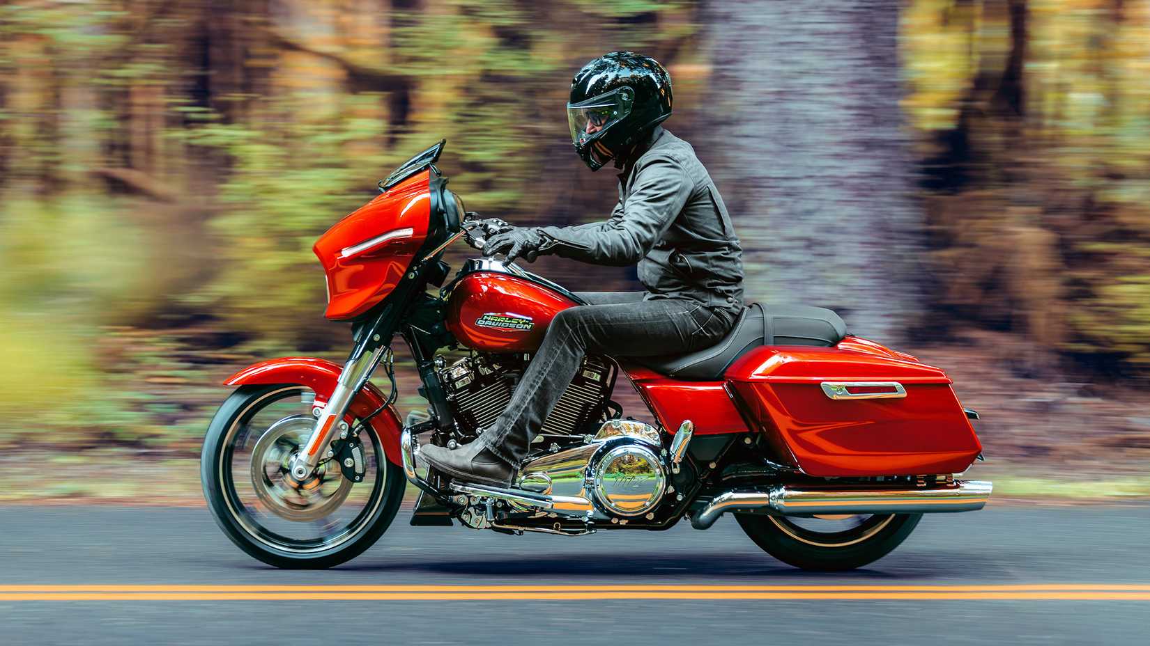 2024 Harley-Davidson Street Glide cruising on a country road