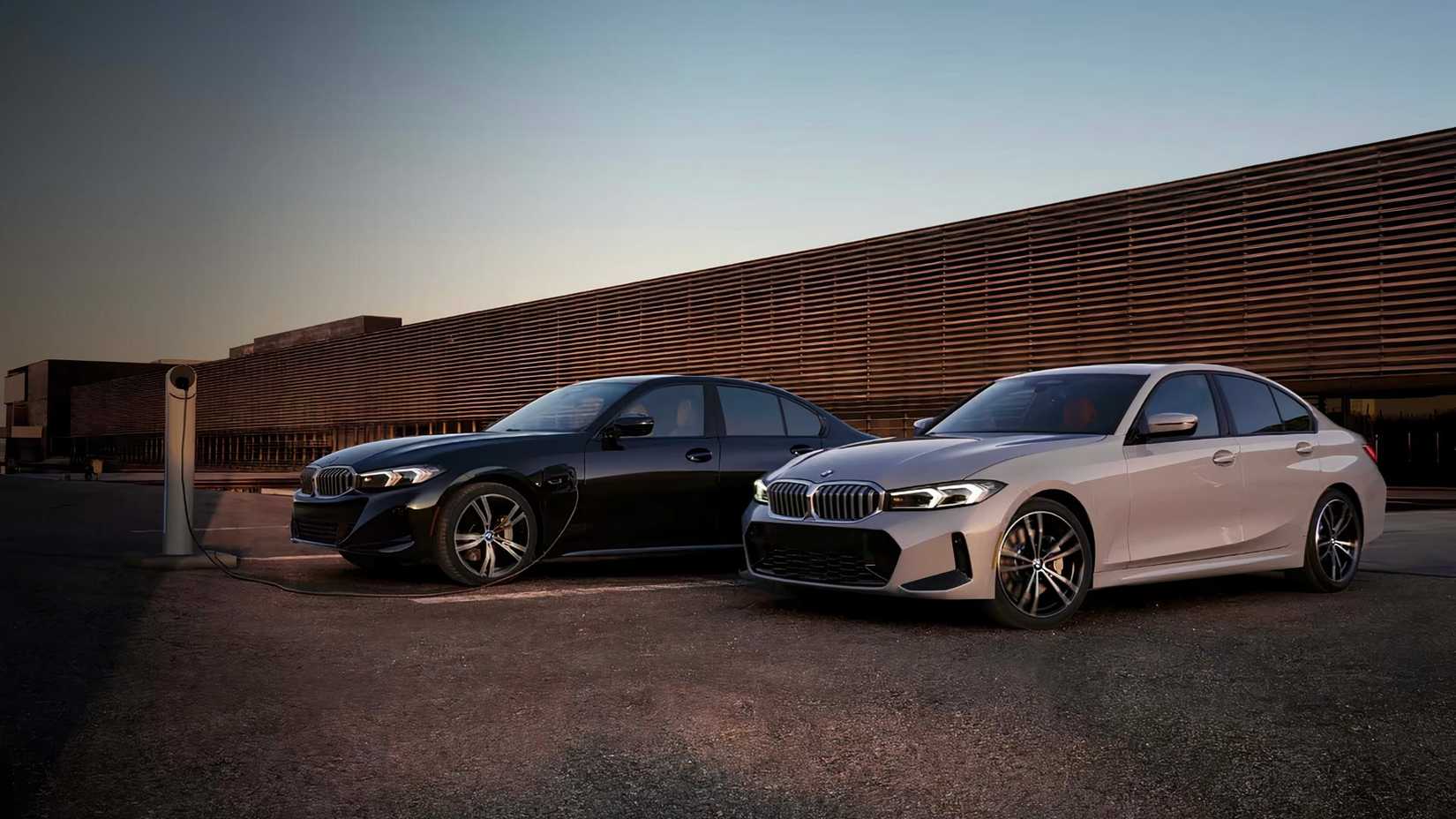 A 2024 BMW 330e and 330i M Sport parked side-by-side