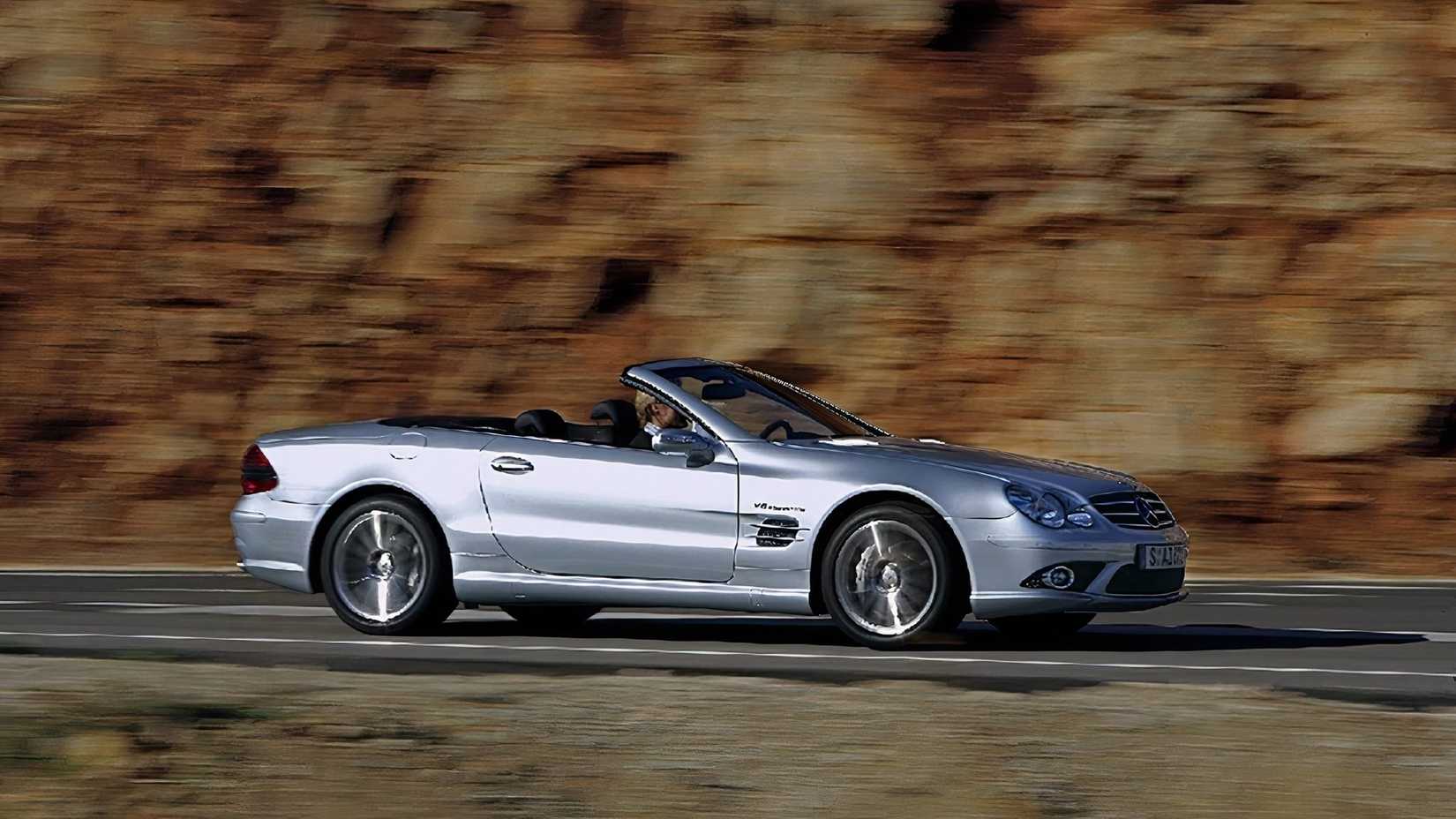 Grey 2003 Mercedes SL55 AMG Driving on road side shot