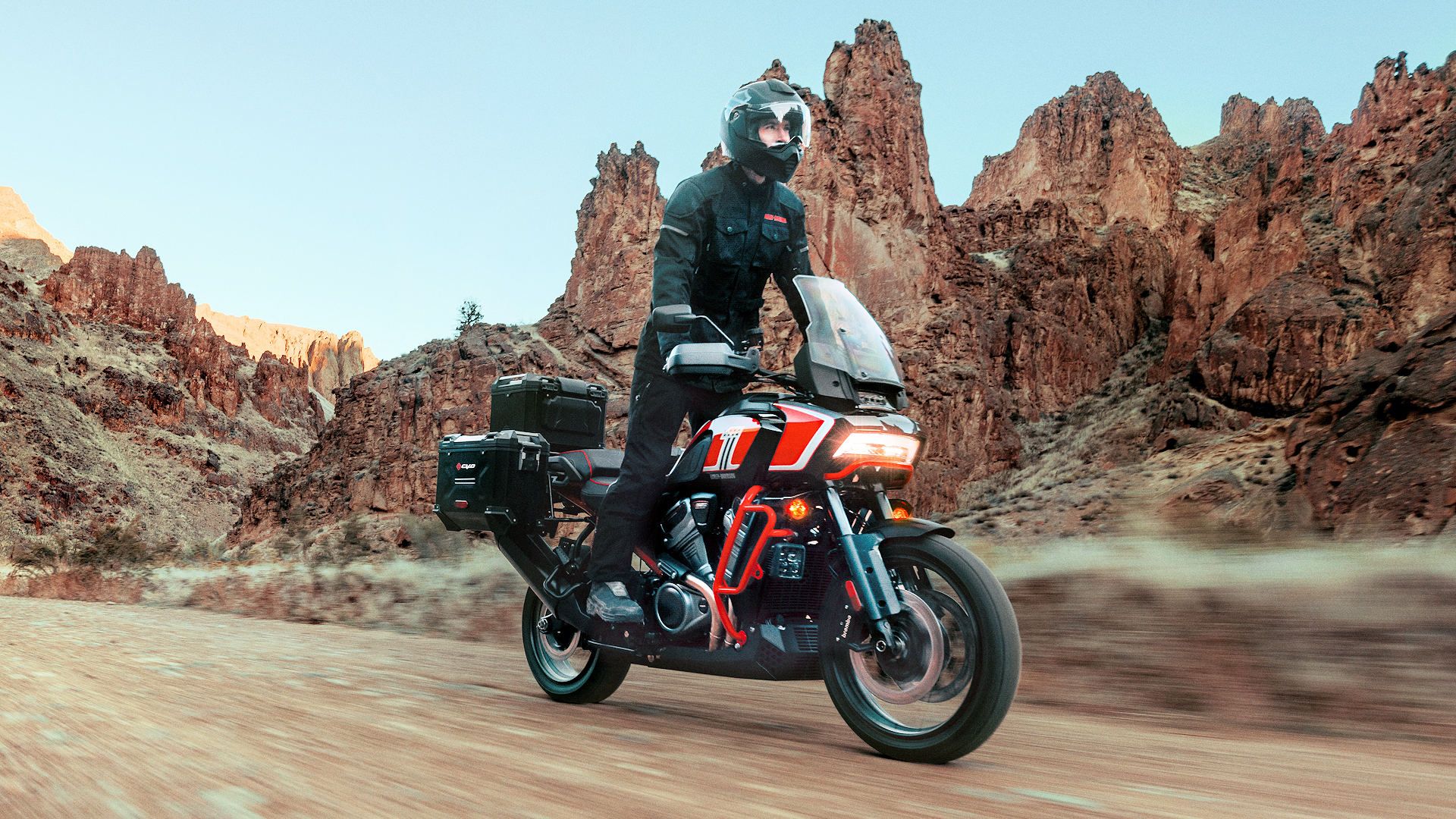 Rider on a 2024 Harley-Davidson CVO Pan America cruising through the desert