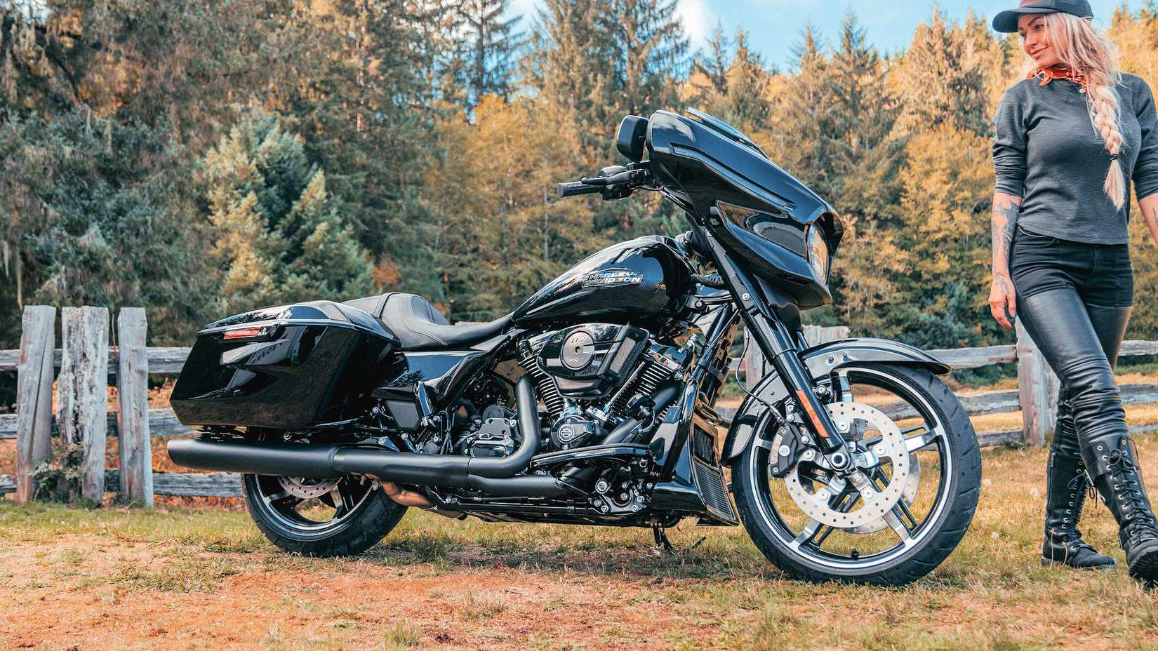Rider walking by a 2024 Harley-Davidson Street Glide