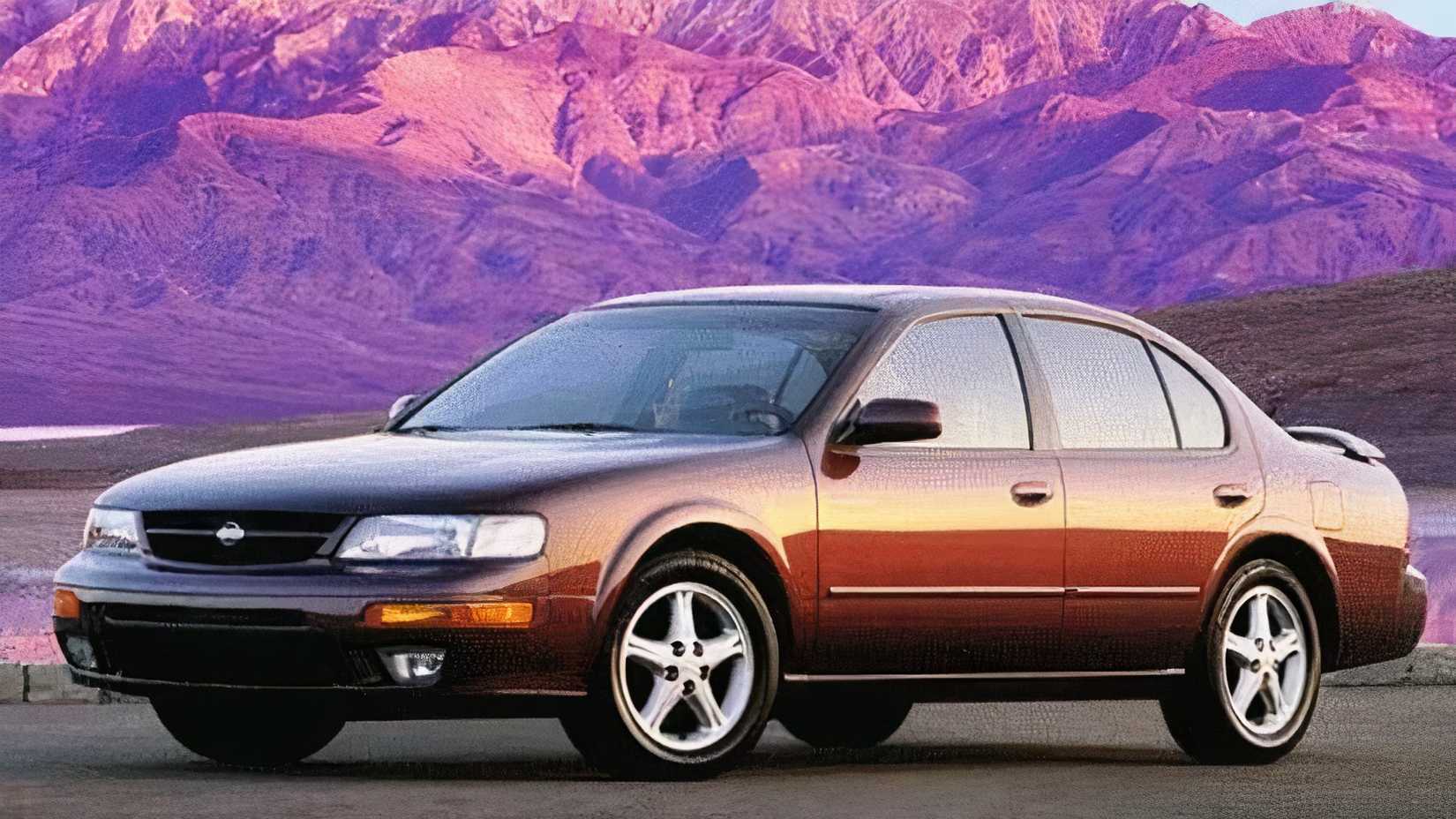 Brown 1998 Nissan Maxima Sedan Parked near a desert