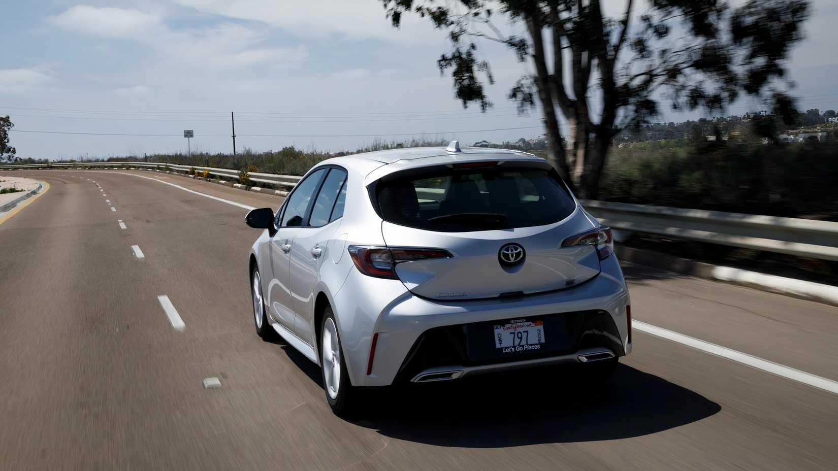 Rear shot of a 2020 Toyota Corolla Hatchback driving
