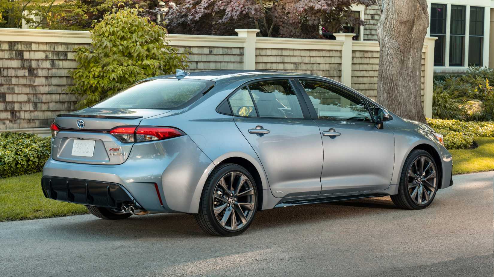 Three-quarter rear view of a Toyota Corolla Hybrid