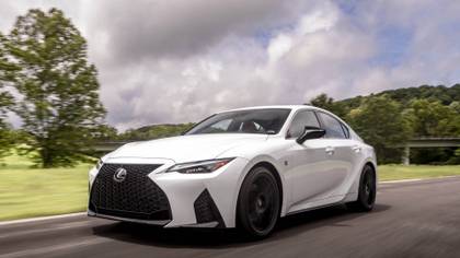 Front 3/4 action shot of a 2024 Lexus IS 350 F Sport