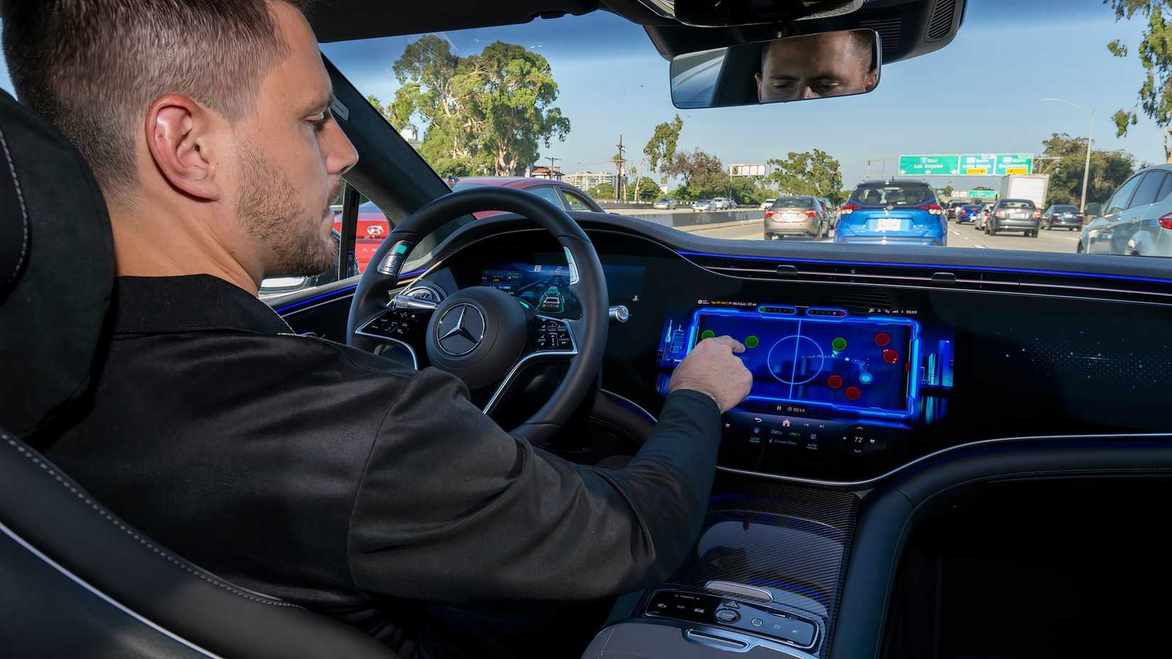 Playing games inside the Mercedes-Benz EQS with Drive Pilot